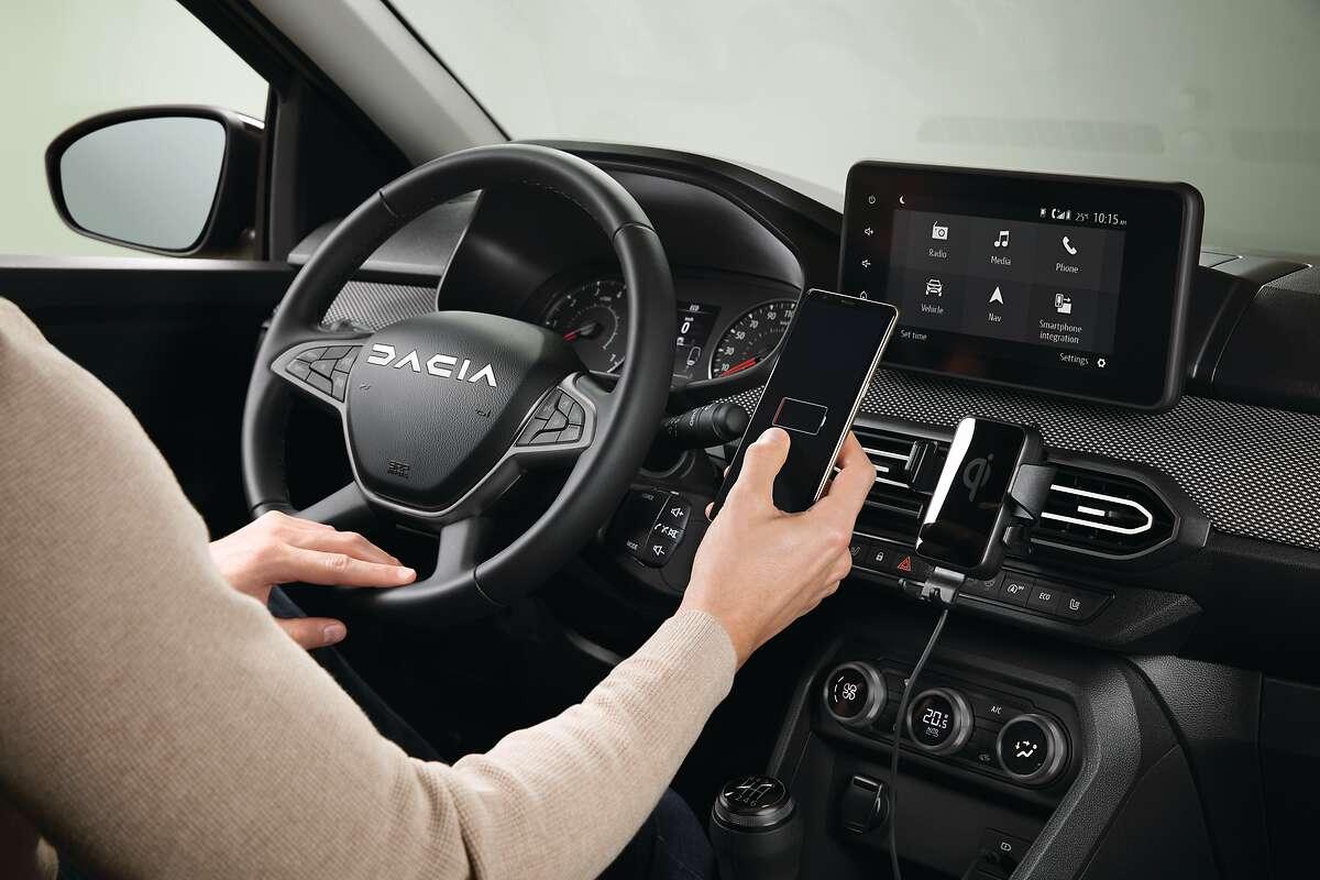 Indukcyjna magnetyczna ładowarka do smartfona mocowana na kratce nawiewu